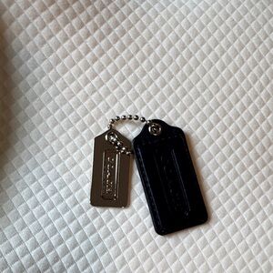 Coach navy blue & and Silver handtag